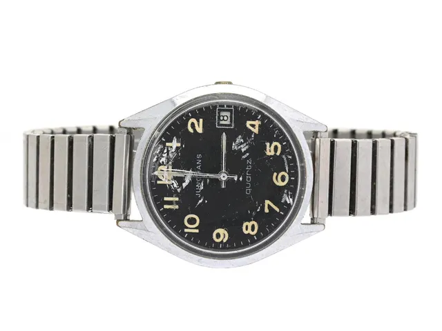 JUNGHANS, herrur, 36 mm, Boett nr. 1019035, vitmetall, quartz (går ej), plexiglas, datum, skadad urtavla, ca 1975, metallänk ej original.