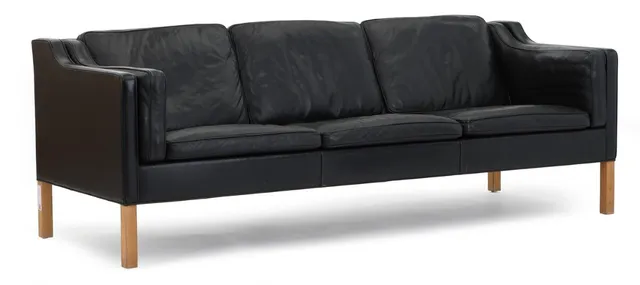 Freestanding three seater sofa with oak legs. Seat, sides and back upholstered with black leather. Model 2213. Designed 1963. Manufactured by Fredericia Furniture. L. 221 cm.