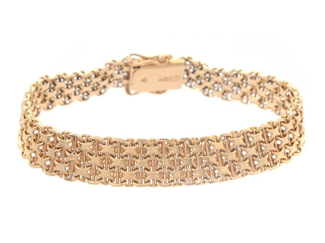ARMBAND, 18K guld, x-länk med stav, kistlås, säkerhetsåttor, längd 7,5 cm, bredd 1 cm, vikt 27,6 g. — Smycken/Armband — Kaplans
