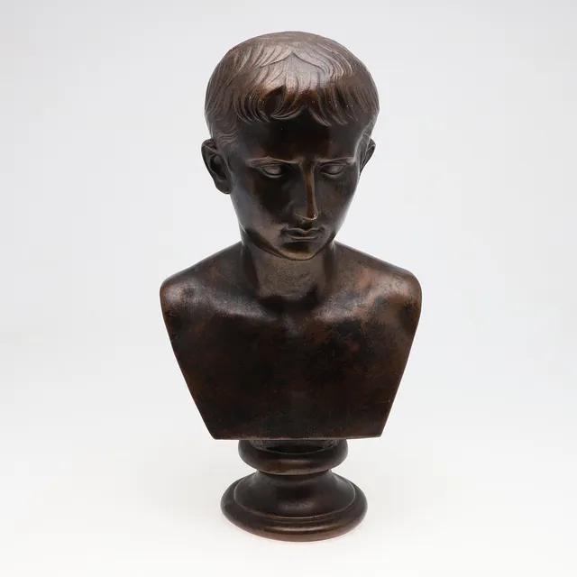 A PLASTER LIBRARY BUST OF CEASAR AUGUSTUS.
