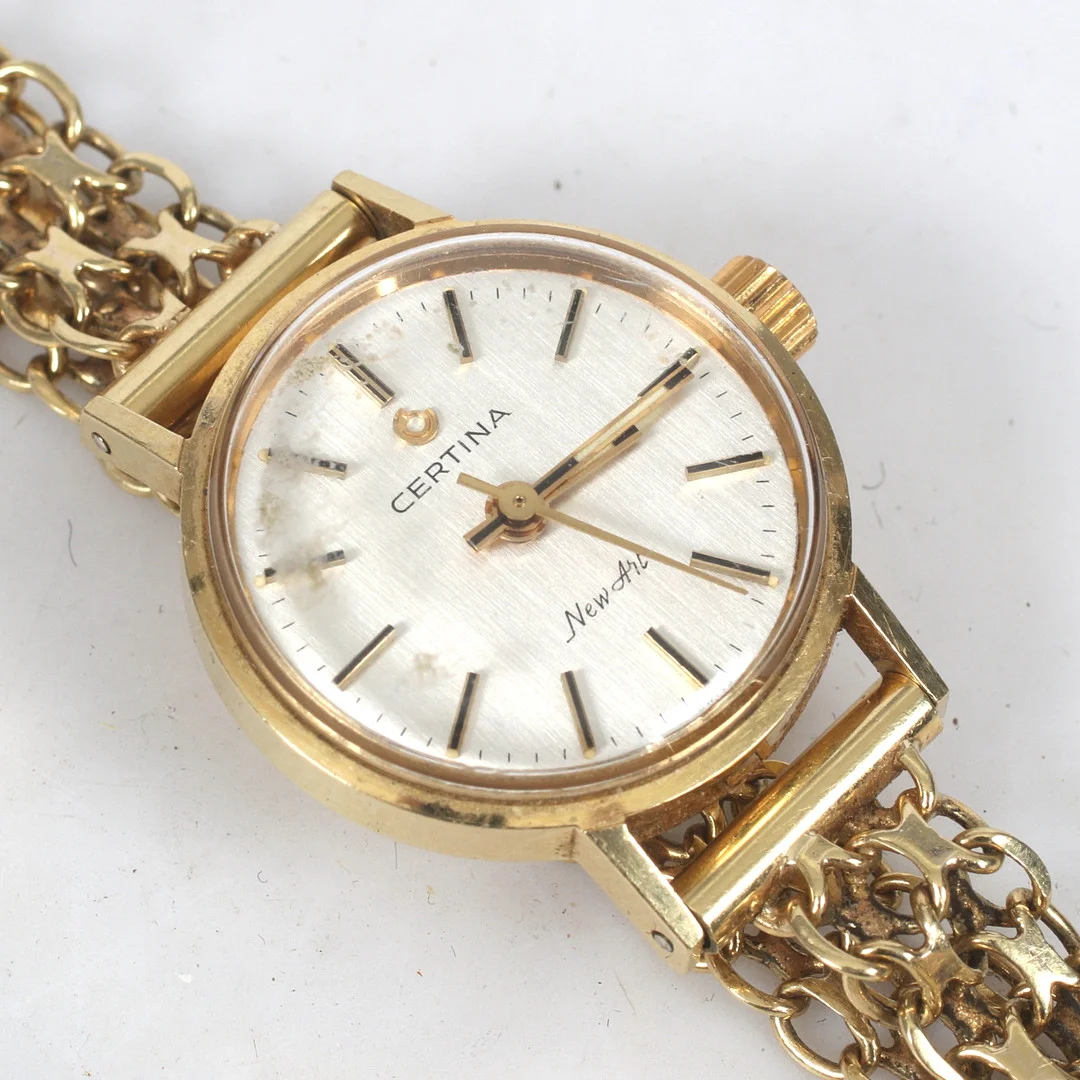 DAMARMBANDSUR, 18k guld, mekanisk, Certina New Art, 1900-talets andra hälft. — Wristwatches — Stadsauktion Sundsvall