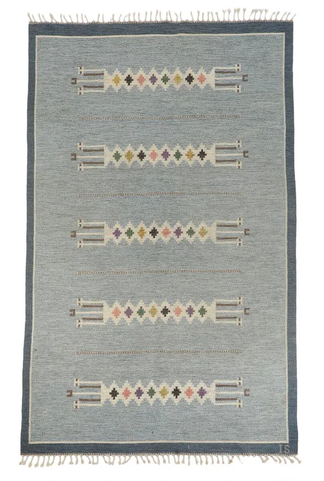 Ingegerd Silow: Handwoven wool carpet in “rölakan” flatweave technique with polychrome geometric pattern.
