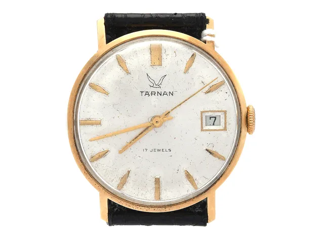 Armbandsur Tärnan 18K, sernr: 31102, Ø 32mm, datum, repigt plastglas, manuell, bucklig boett, läderband