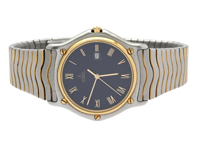 EBEL, Sport Classic, Senior, Serie nr. 14915978, Boett nr. 183903, herrur, 34 mm, stål/guld, quartz, safirglas, datum, integrerad originallänk (bicolour), viklås, ca 1990.