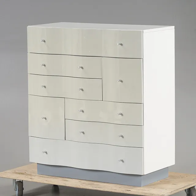 TOMAS JELINEK. Byrå "Vajer" Vit och ljusgrå, IKEA, 1990-tal.