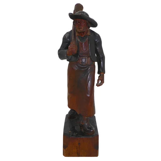 GESCHNITZTE HOLZSKULPTUR EINES HANDWERKERS – PROF. OTTO MORODER (1894–1977).