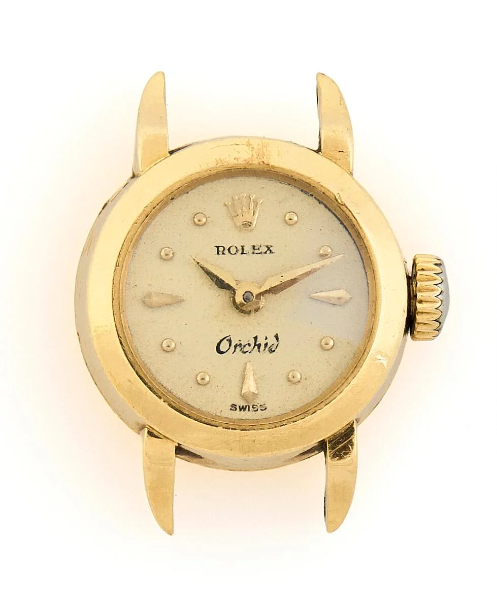 Orchid of 18k gold, ref. 9259. Mechanical movement with manual winding. Ø 15 mm. 1940s. — Clocks & watches/Wristwatches — Bruun Rasmussen