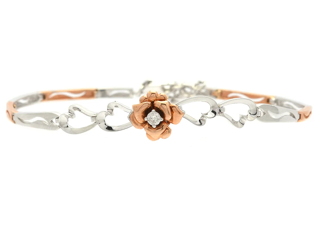 ARMBAND, 18K roséguld, delvis rodinerad, briljantslipad diamant ca 0,06 ct, ca W(H)/P, längd 17-19 cm, vikt 7,2 g. — Smycken/Armband — Kaplans