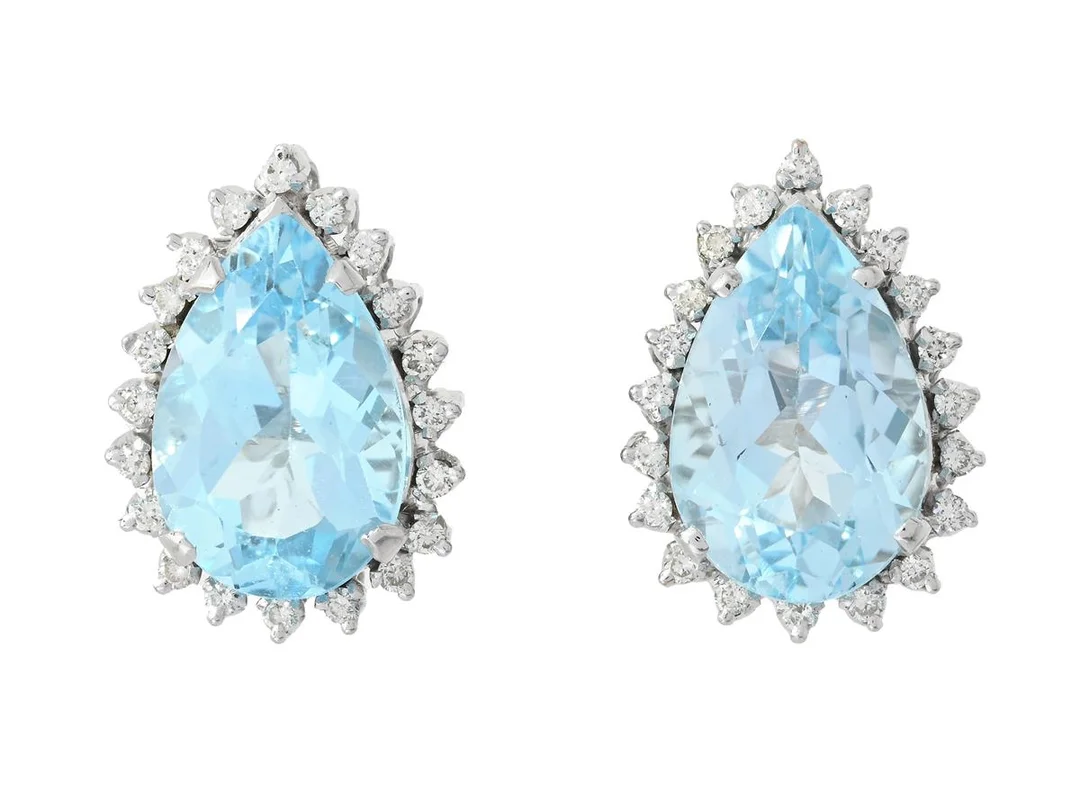ÖRHÄNGEN, 18K vitguld, droppslipade topaser ca 10,2 ctv, briljantslipade diamanter ca 0,40 ctv, ca W-Cr/VVS, vikt 7,6 g, slitna fasetter. — Smycken/Örhängen — Kaplans