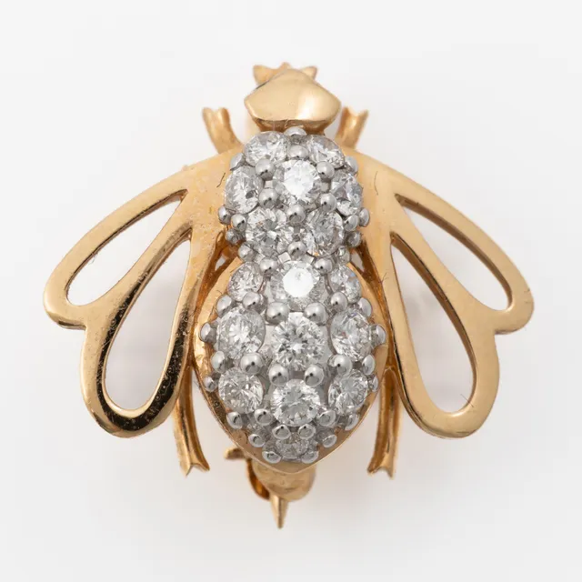 Brosch i form av bi 18K guld med runda briljantslipade diamanter.