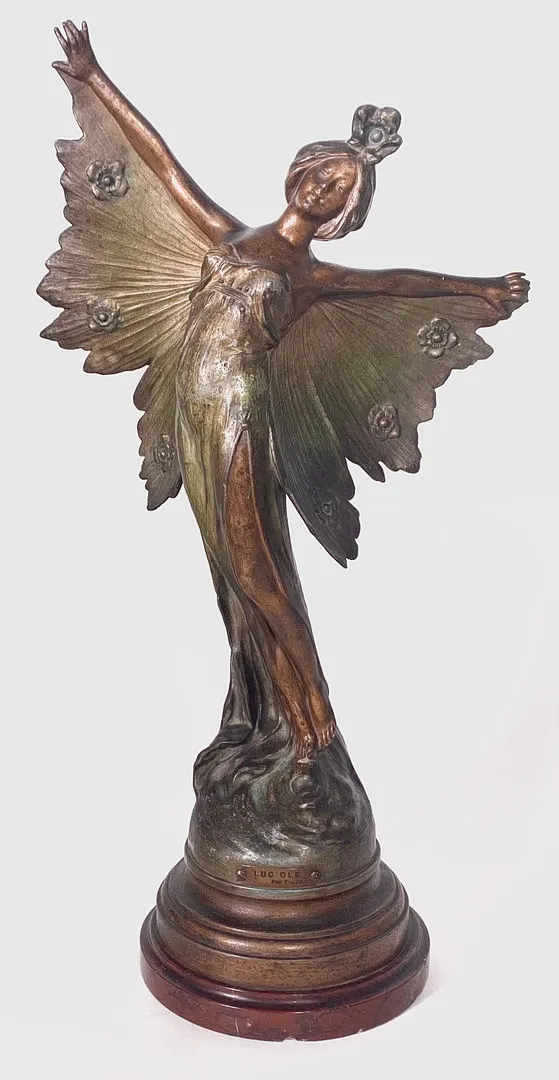 EMIL FUCHS (1866-1929). "LUCIOLE". ESCULTURA EN CALAMINA PATINADA.