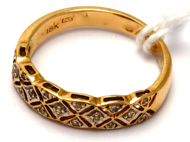 Ring 18K 2,7g Ø16¼ med diamanter och gravyr 17xca0,005ct
