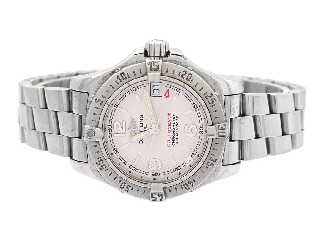 BREITLING, Colt Oceane (500M/1650FT), Chronometre, Cal 77, Verk nr. 960846, Serie nr. 960846, Ref nr. A77380, Boett nr. 0906 B5, damur, 33,2 mm, stål, SuperQuartz, safirglas, datum, defekt (går ej, akut servicebehov), Professionallänk II, viklås, S1006/813A, cert, april 2006, box. — Klockor/Breitling — Kaplans