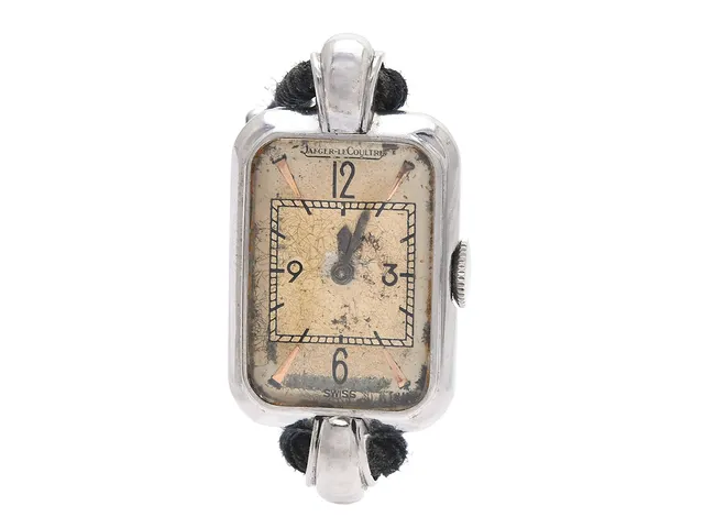 JAEGER-LE COULTRE, damur, 16 x 22,5 (33) mm, Cal 407, Serie nr. 266539, Boett nr. 206033, stål, manuell, plexiglas, skadad urtavla, defekt, integrerat tygband, ca 1943, box.