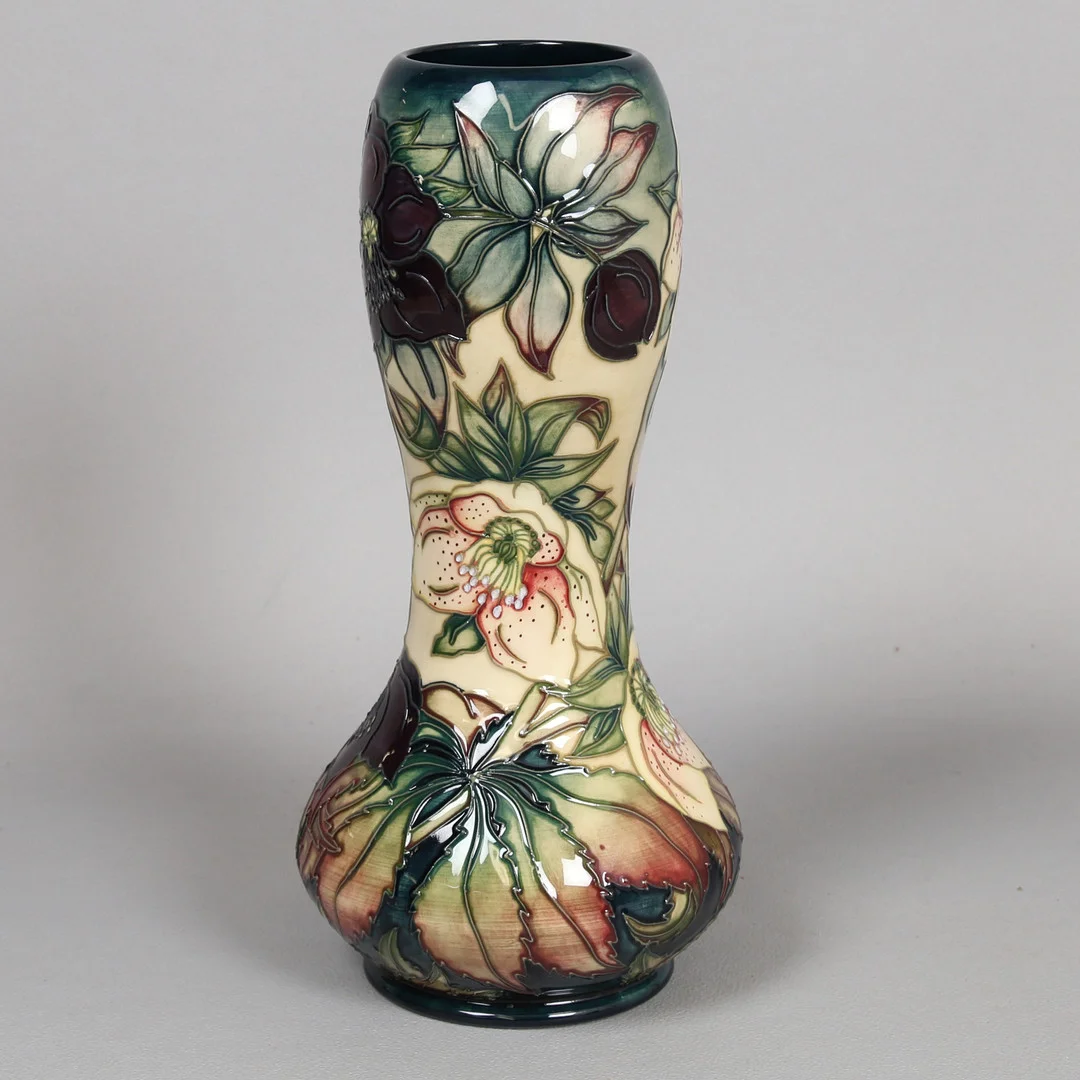 A MOORCROFT ASHWOOD HELLEBORE PATTERN VASE DESIGNED BY NICOLA SLANEY. — European — Bishop & Miller