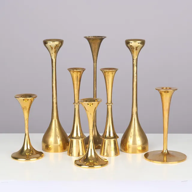 DANSK DESIGN. En samling lysestager af messing, 1900-tallets anden halvdel, (8).