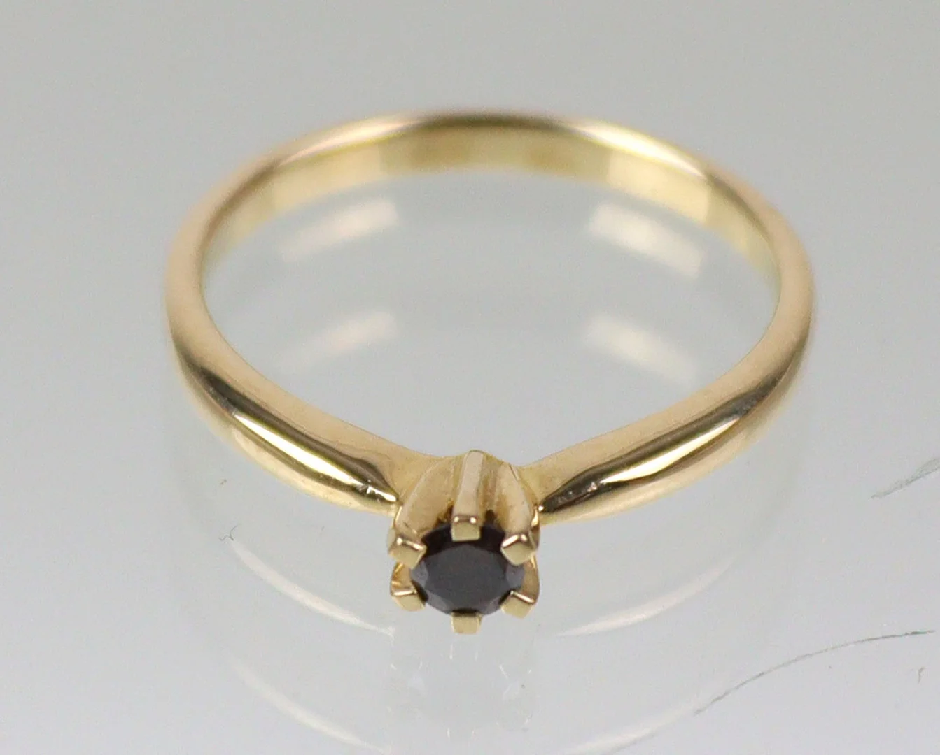 ROTER COGNAC BRILLANT RING, Gold 375. — Rings — Auktionshaus Bossard