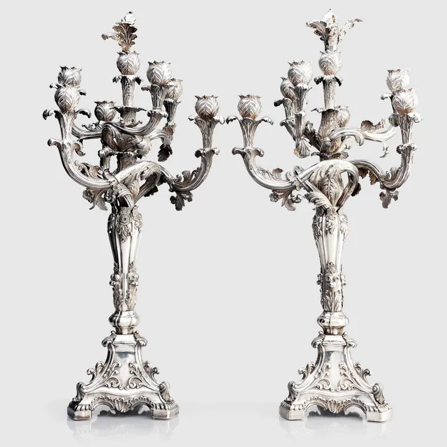 Gustaf Möllenborg, kandelabrar för sju ljus vardera, ett par, silver, Stockholm 1844. Nyrokoko.
