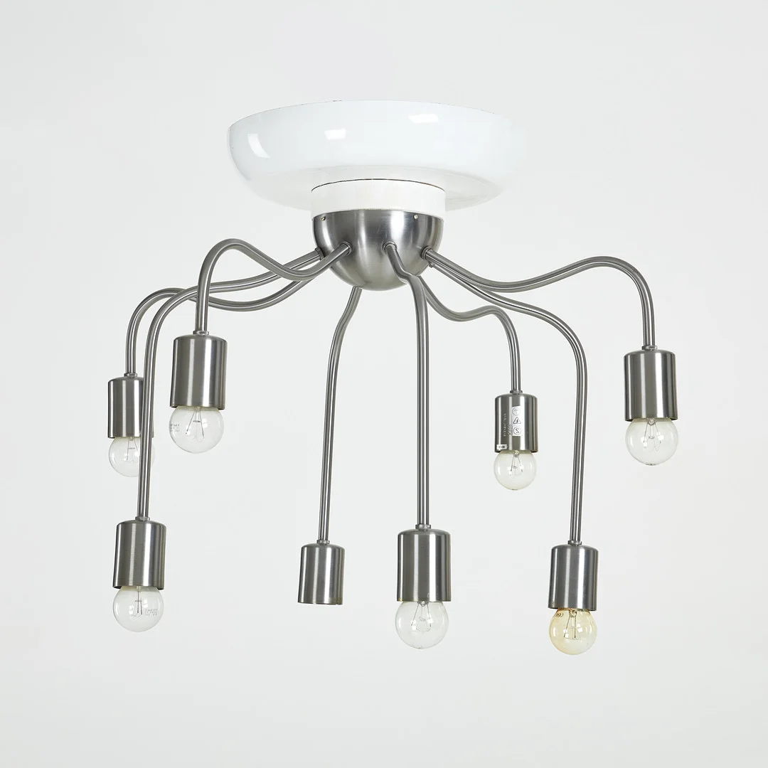 JOSEF FRANK. Taklampa, modell 2358, Firma Svenskt Tenn, 8 ljusarmar, borstad vitmetall, monterad på lackerad kupa, märkt. — Ceiling lights — Stockholms Auktionsverk Sickla